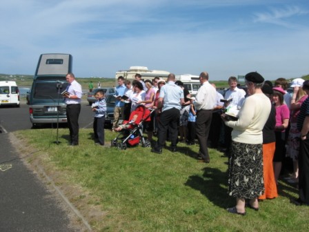 This summer the Youth Fellowship held open-air outreach services in a number of locations in the Coleraine area. These included Drumadragh, Windyhall, Portballintrae and Macosquin. Various members and friends of the Youth Fellowship took part in the meetings.